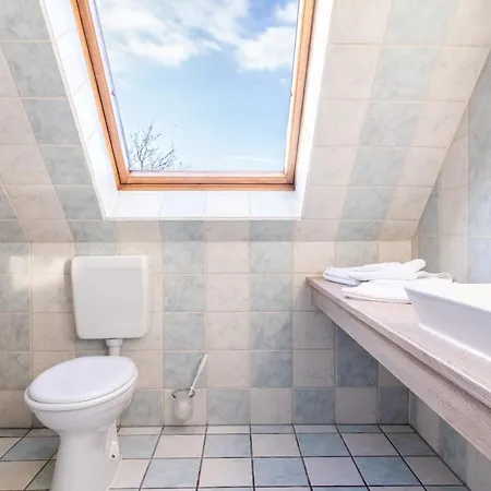 Casa de Férias Ferienhaussiedlung Strandperlen Buchenhof 2a